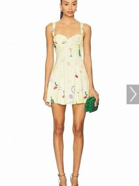 For Love And Lemons Pale Yellow Printed Mini Dress with Playful Motifs